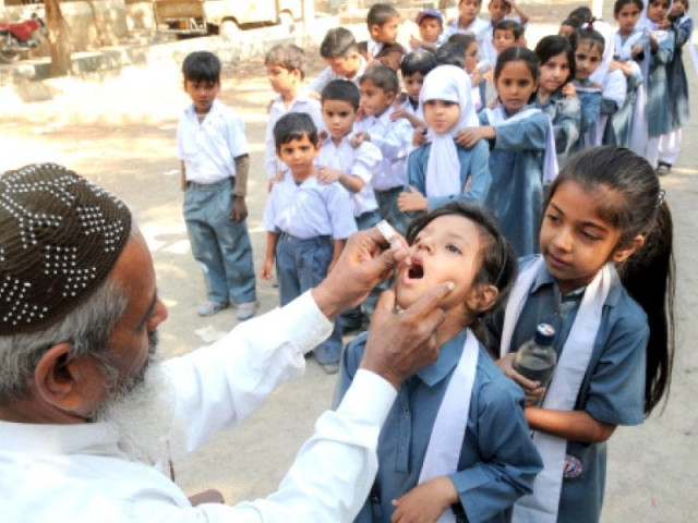 a health worker is administering oral polio vaccines to children inactivated vaccines will be administered to children through injections during the campaign that starts today photo file a health worker is administering oral polio vaccines to children inactivated vaccines will be administered to children through injections during the campaign that starts today photo file