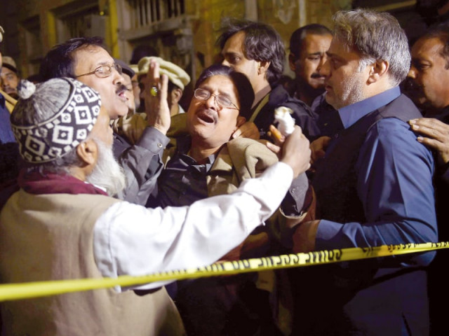 relatives of victims mourn outside the site of a blast in rawalpindi photo afp relatives of victims mourn outside the site of a blast in rawalpindi photo afp