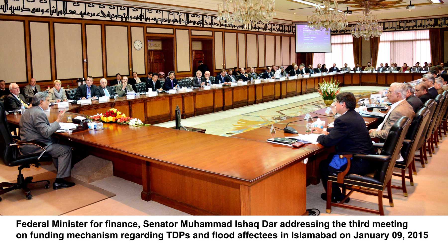 finance minister ishaq dar l addressing the donors conference at the pm house on friday photo pid