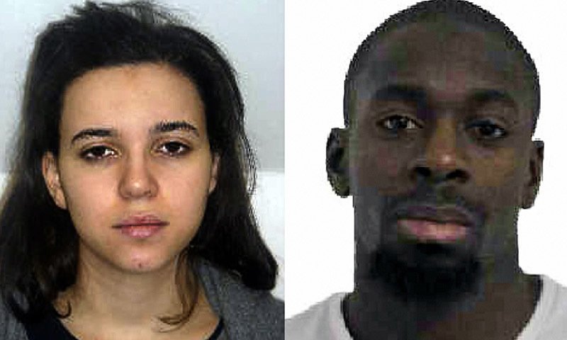 this combination of images released by the french police shows hayat boumeddiene l and amedy coulibaly r suspected of being involved in the killing of a policewoman in montrouge on january 8 photo afp