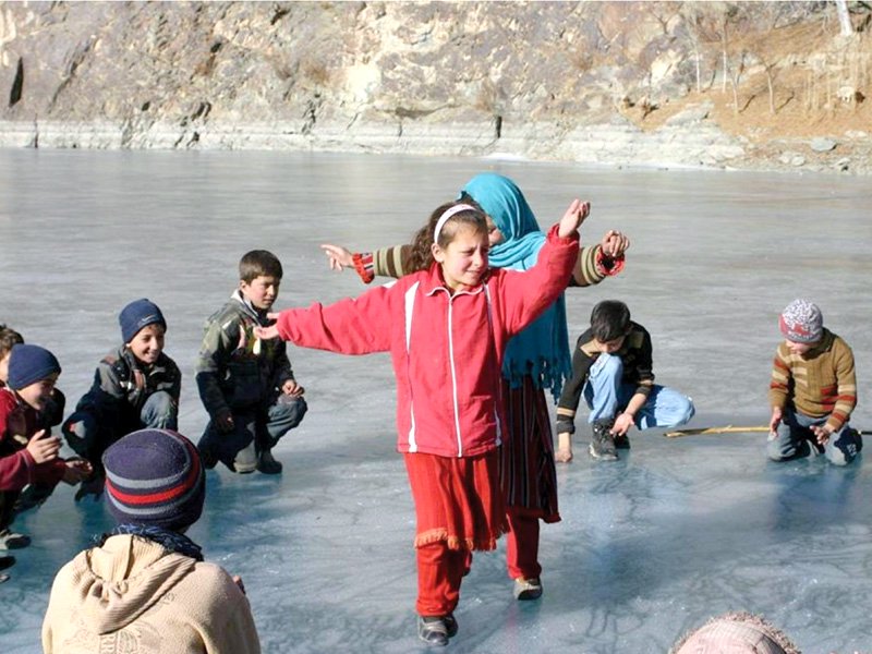 children play on kalki lake in ghizer district photo abdul rehman bukhari