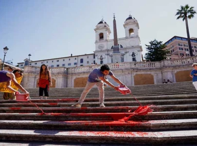 women s rights activists splash red paint on rome s spanish steps women s rights activists splash red paint on rome s spanish steps