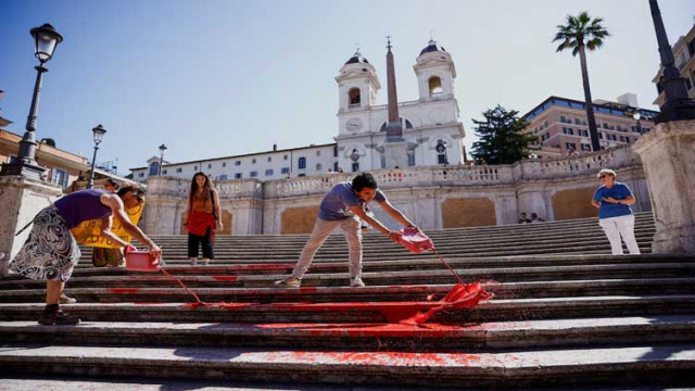 women s rights activists splash red paint on rome s spanish steps women s rights activists splash red paint on rome s spanish steps