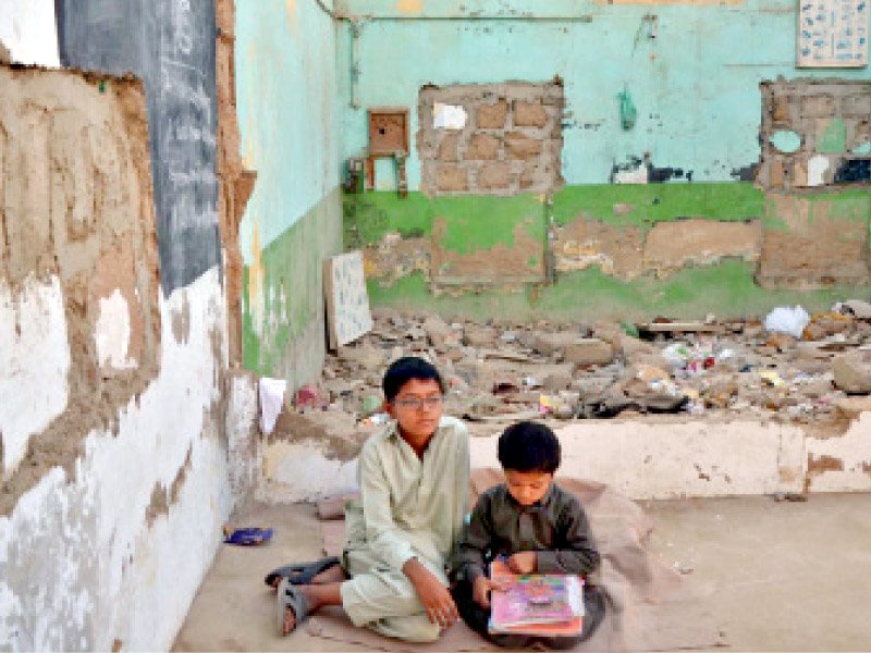 the government school in green town was reduced to rubble by an encroacher around five months ago the government s failure to take action has led the occupiers to make a cement wall dividing the premises into two halves during the winter break photo online