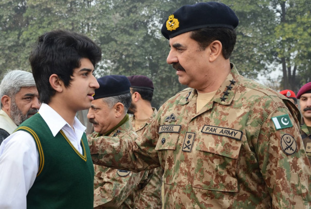 this handout photograph released by inter services public relations ispr office on january 12 2015 shows army chief raheel sharif r speaking with a student at the army public school after it was reopened following an attack there by taliban militants in peshawar photo afp this handout photograph released by inter services public relations ispr office on january 12 2015 shows army chief raheel sharif r speaking with a student at the army public school after it was reopened following an attack there by taliban militants in peshawar photo afp