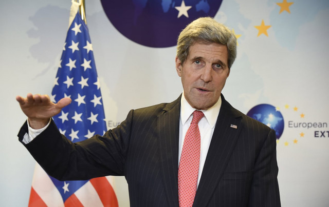 in this file photo us secretary of state john kerry gives a joint press with high representative of the union for foreign affairs and security policy federica mogherini unseen after their meeting in brussels on december 3 2014 photo afp