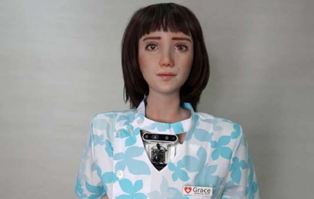 humanoid robot grace developed by hanson robotics and designed for the healthcare market to interact and comfort the elderly and isolated people especially those suffering during the coronavirus disease covid 19 pandemic is seen at the company s lab in hong kong china june 8 2021 photo reuters