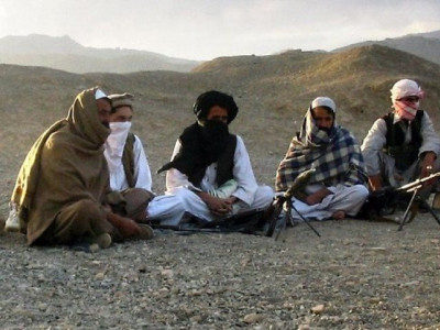 afghan policeman kills commander district chief officials