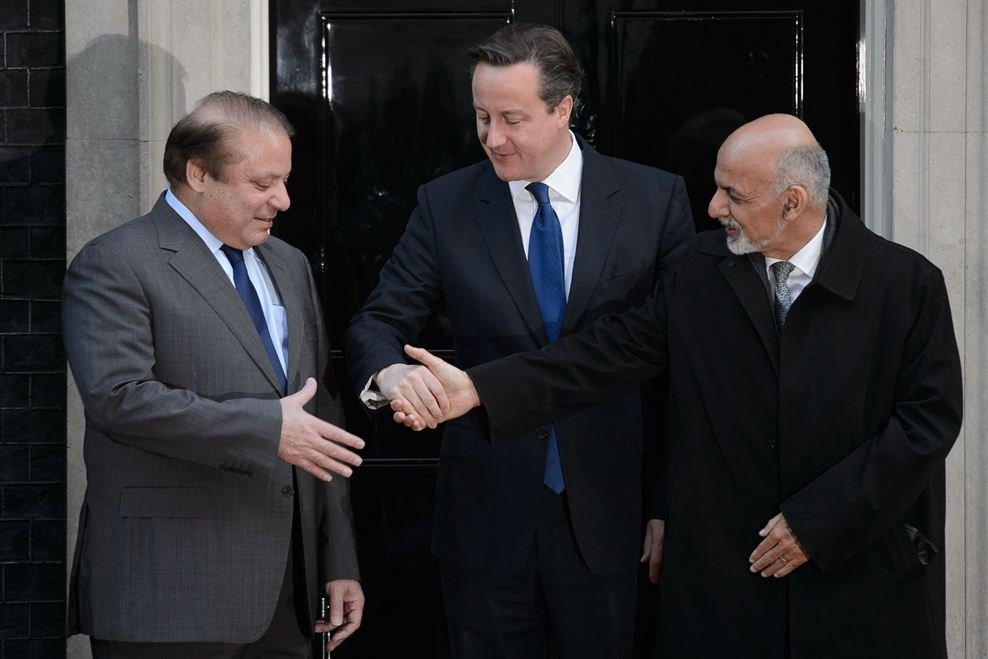 in this file photo pm nawaz sharif shakes hand with david cameron and ashraf ghani photo afp