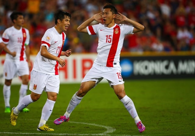 wu xi r of china celebrates his goal during the first round asian cup soccer match between china and uzbekistan at the suncorp stadium in brisbane photo afp wu xi r of china celebrates his goal during the first round asian cup soccer match between china and uzbekistan at the suncorp stadium in brisbane photo afp