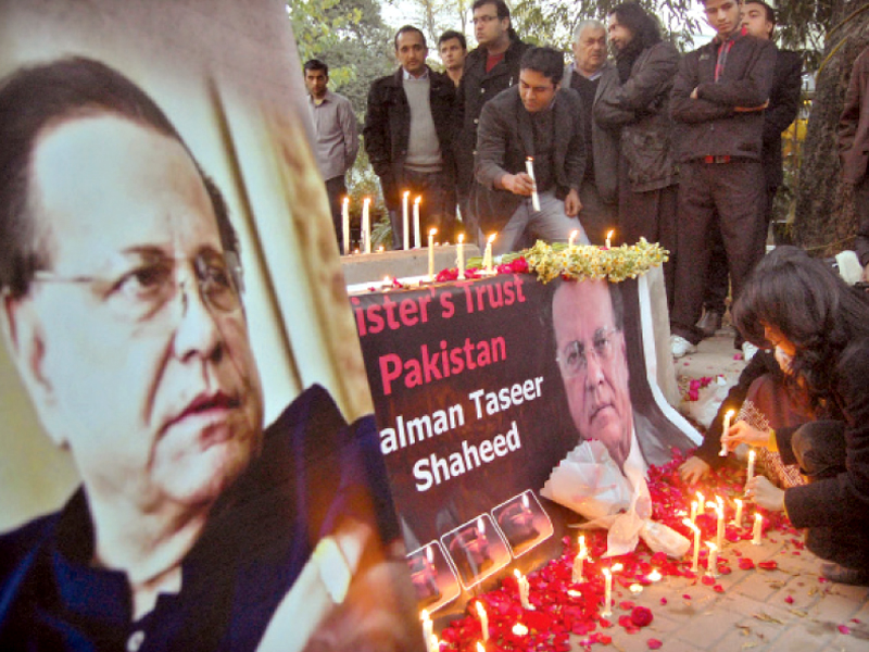 members of the public like candles in the memory of slain governor photo muhammad javaid express