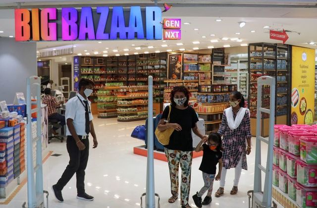 people exit the big bazaar retail store in mumbai india november 25 2020 photo reuters