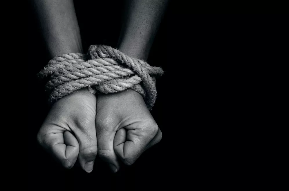 father brother handed over to police for their alleged involvement in kidnapping stock image father brother handed over to police for their alleged involvement in kidnapping stock image