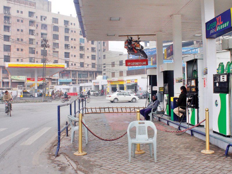 several petrol stations in the city were cordoned off on friday photo abid nawaz express