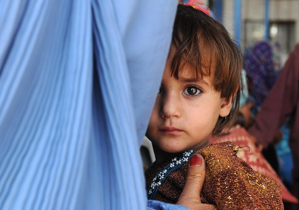 a file photo of an afghan refugee girl in peshawar photo afp
