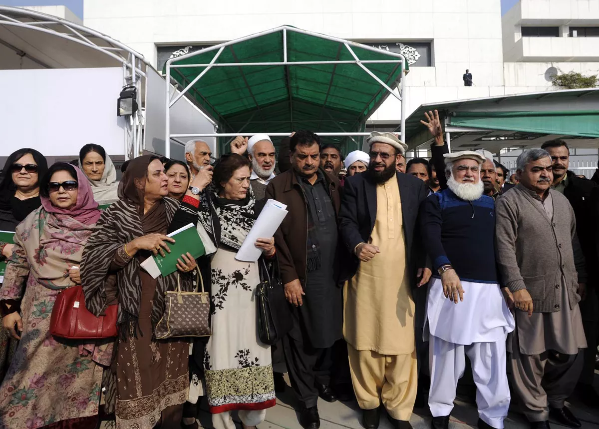 the lawmakers protesting outside parliament against the cartoons which have been roundly criticised by muslims across the world photo inp the lawmakers protesting outside parliament against the cartoons which have been roundly criticised by muslims across the world photo inp