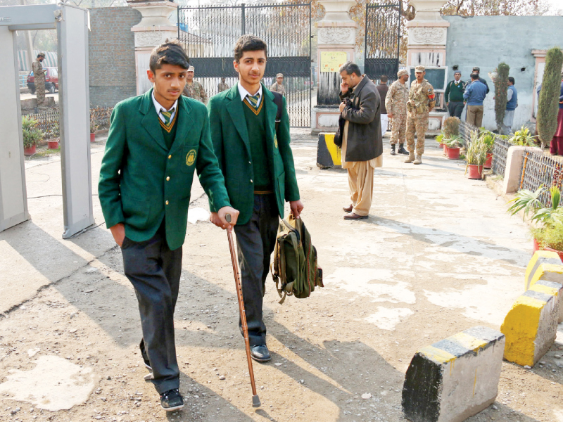 injured aps student leaves after day in class photo muhammad iqbal