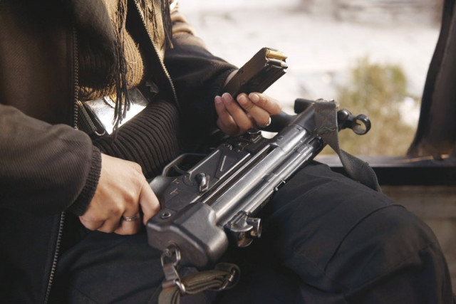 a female commando with an mp5 on the unit patrol vehicle photo sa adia khan a female commando with an mp5 on the unit patrol vehicle photo sa adia khan