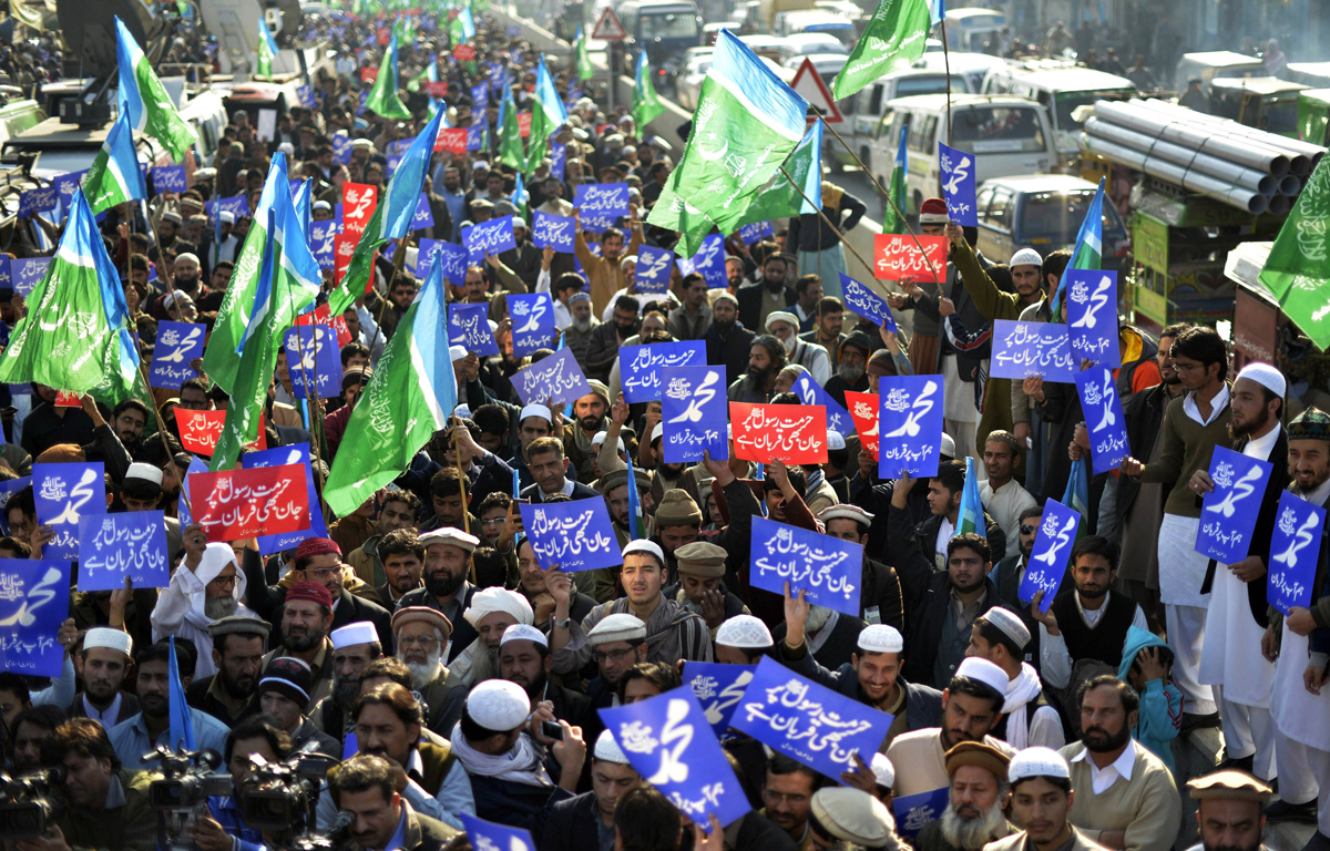 demonstrators stage a protest against the printing of sacrilegious caricature by french magazine charlie hebdo in lahore on january 16 2014 photo afp