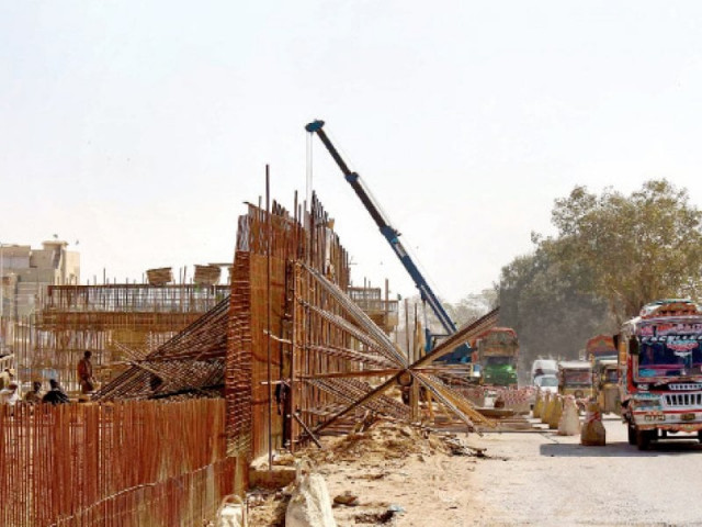 despite the release of funds construction on the malir flyover projects has continued to face delays photo express despite the release of funds construction on the malir flyover projects has continued to face delays photo express