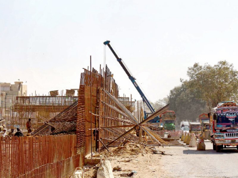 despite the release of funds construction on the malir flyover projects has continued to face delays photo express