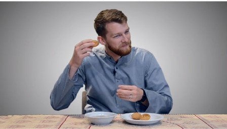 a clip from the video showing an employee put a gol gappa to the test