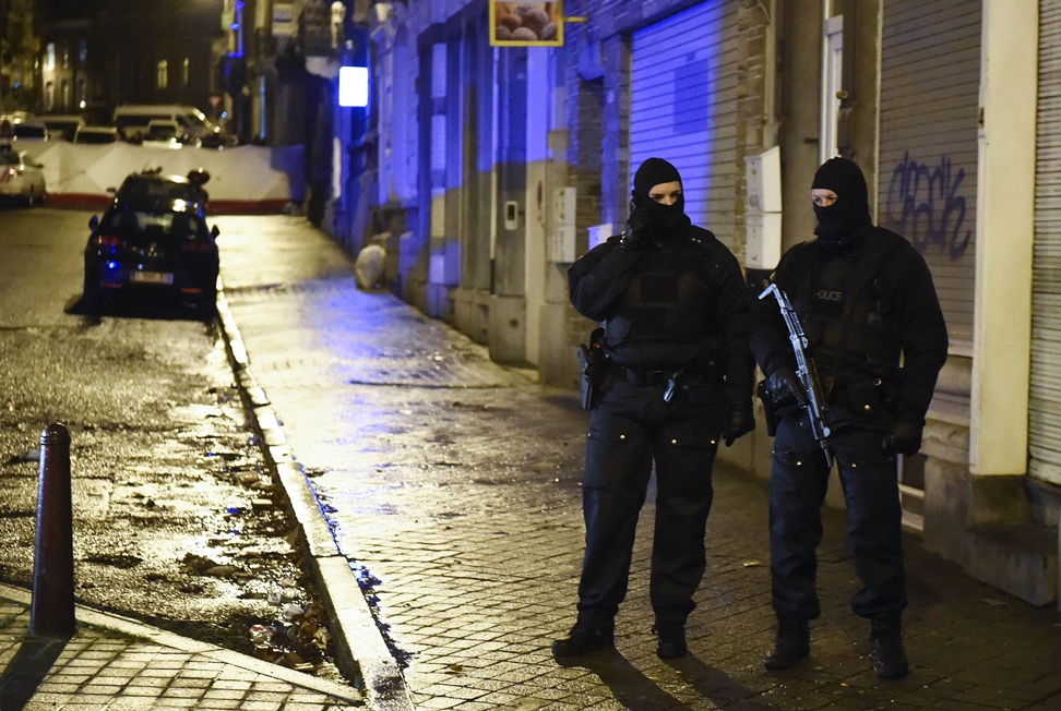 police stands guard in verviers eastern belgium on january 15 2015 after two men were reportedly killed during an anti terrorist operation photo afp