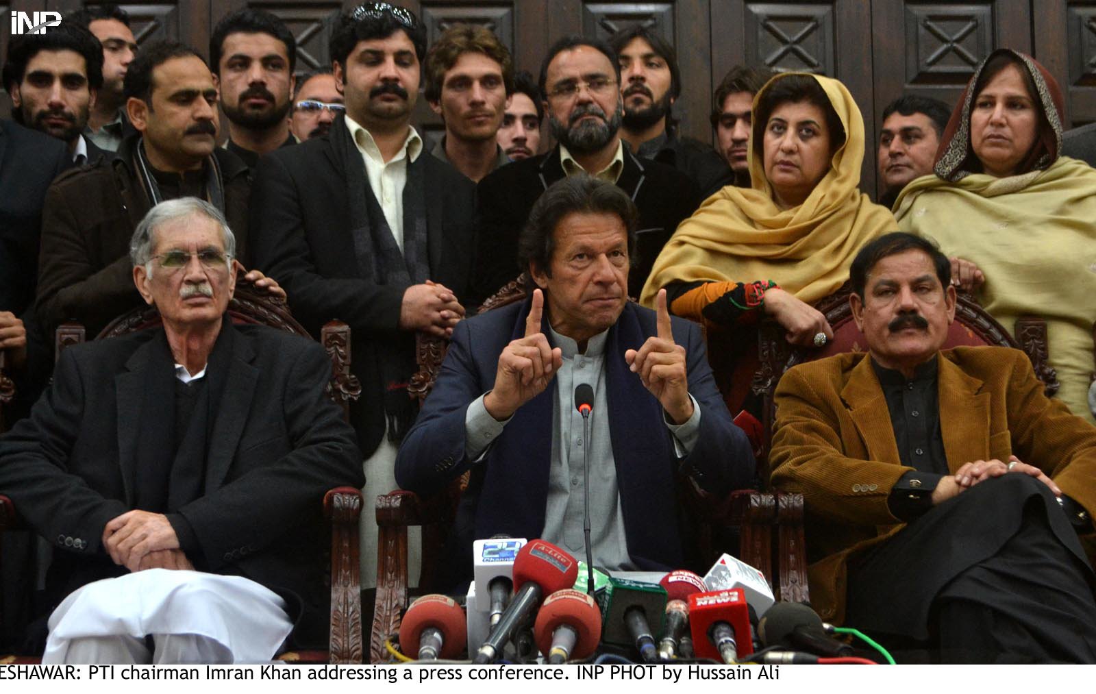 imran khan during a press conference in peshawar on wednesday photo inp