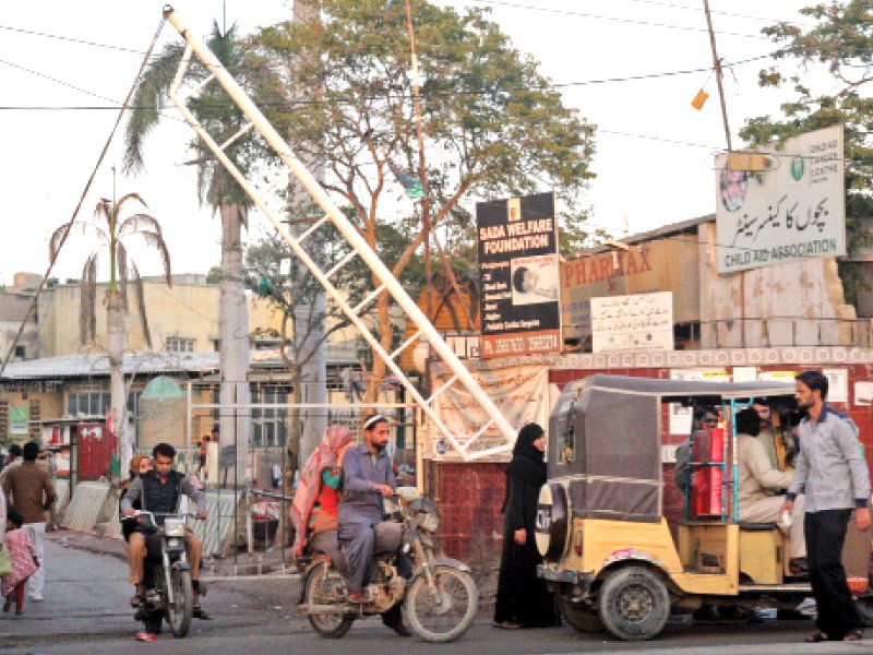 the national institute of child health wore the look of a political manifesto until a few days ago as the facility s staff who were members of political parties hung huge banners and posters on the facade of its buildings photo athar khan express