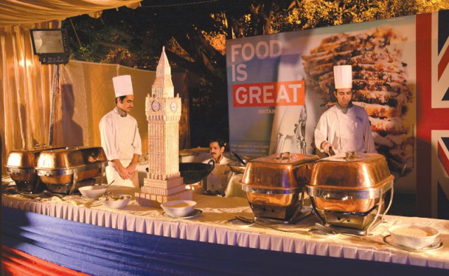 chefs wait next to the buffet and live cooking stations at the festival photo huma choudhary express chefs wait next to the buffet and live cooking stations at the festival photo huma choudhary express