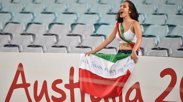 safety measures iranian authorities censored coverage of women such as one holding the iranian flag which read will alireza iranian team s goalkeeper marry me photo afp safety measures iranian authorities censored coverage of women such as one holding the iranian flag which read will alireza iranian team s goalkeeper marry me photo afp