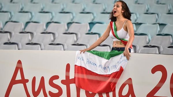 safety measures iranian authorities censored coverage of women such as one holding the iranian flag which read will alireza iranian team s goalkeeper marry me photo afp