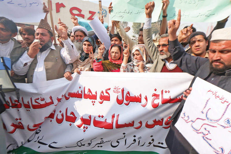 pti workers protest against charlie hebdo outside peshawar press club photo muhammad iqbal express