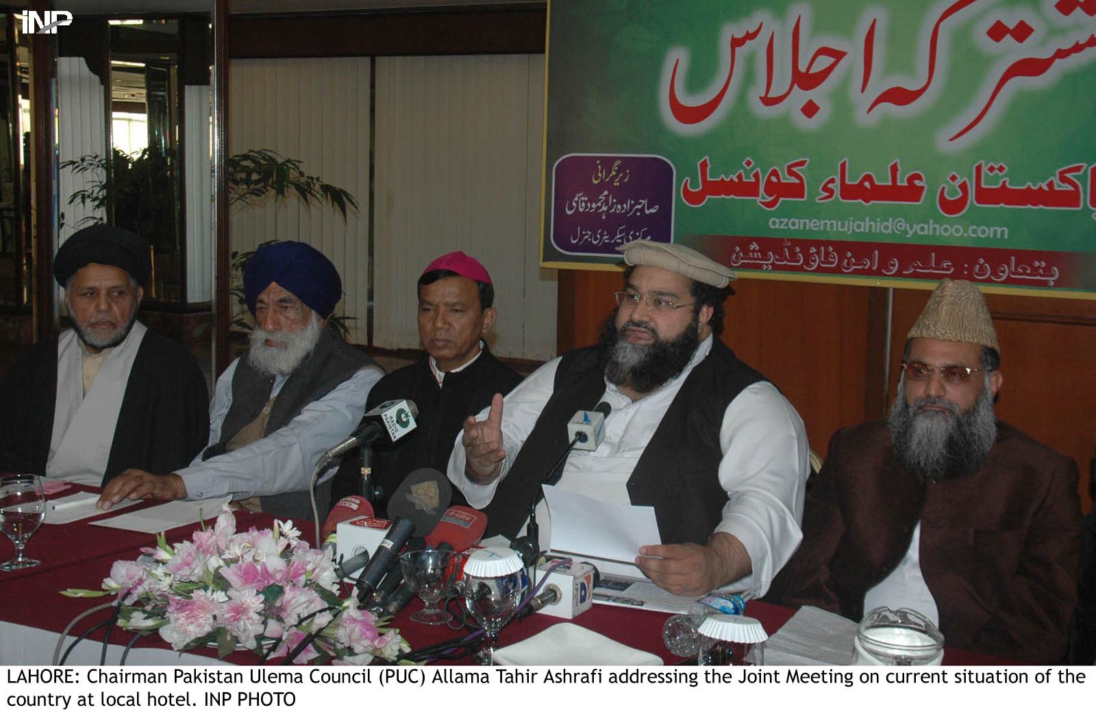 puc chief tahir ashrafi addresses an inter faith harmony meeting in lahore on monday photo inp