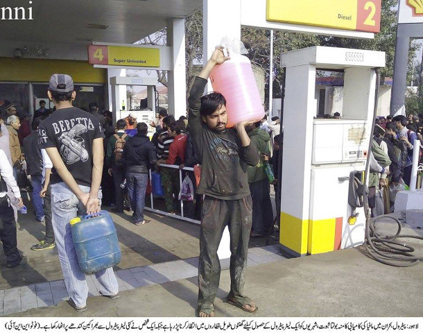 a man carries a container full of petrol at a pumping station in lahore on monday photo nni a man carries a container full of petrol at a pumping station in lahore on monday photo nni