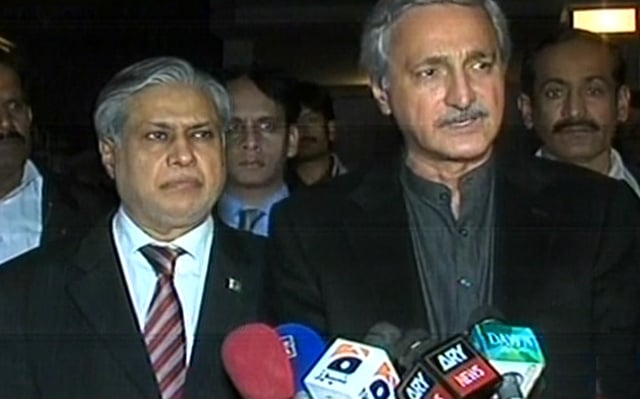 pti leader jahangir tareen and finance minister ishaq dar talking to media persons after a meeting between government and pti s negotiation committee in islamabad on early tuesday