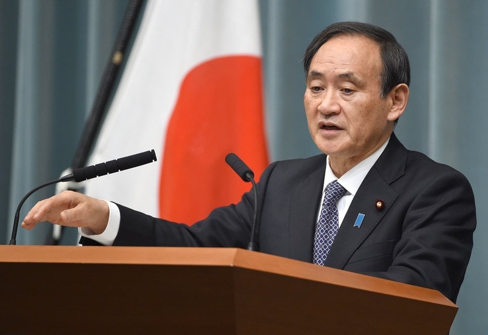 japanese chief cabinet secretary yoshihide suga answers questions during a press conference at the prime minister 039 s official residence in tokyo on january 21 2015 japanese prime minister shinzo abe was rushing home from the middle east to take charge of tokyo 039 s response after is militants threatened to kill two nationals unless he pays a 200 million usd ransom photo afp