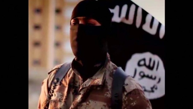 a masked man speaking is shown in a video released by is militants in september 2014 photo reuters a masked man speaking is shown in a video released by is militants in september 2014 photo reuters