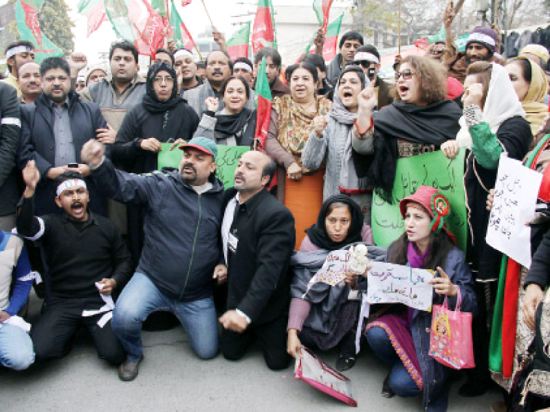 pti workers chant slogans against the government saying it failed to control fuel shortage photo shafiq malik express