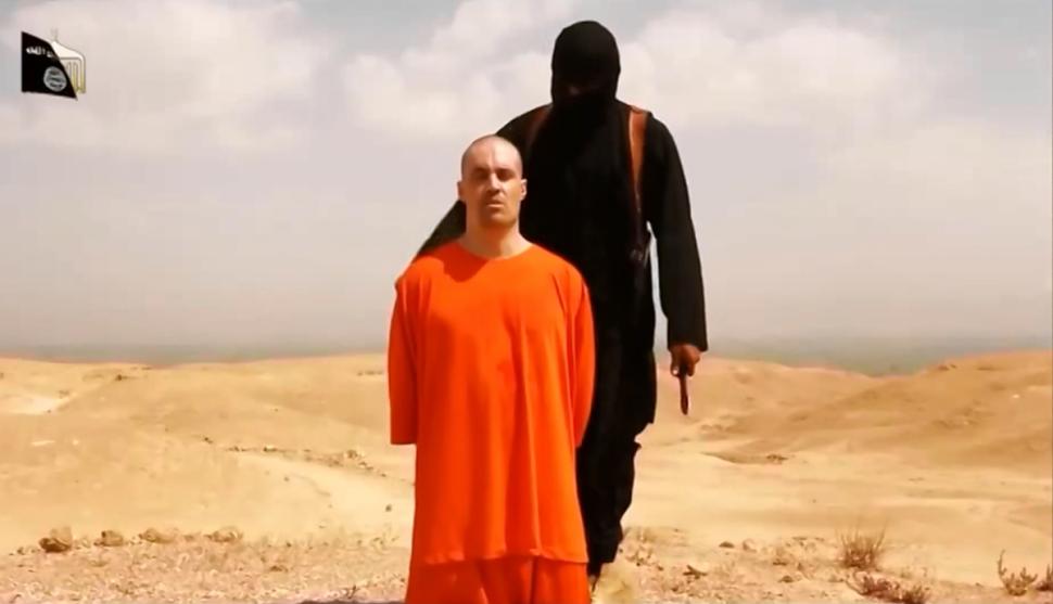 us journalist james foley was beheaded by an isis militant the horrific killing was recorded on video photo youtube screen grab