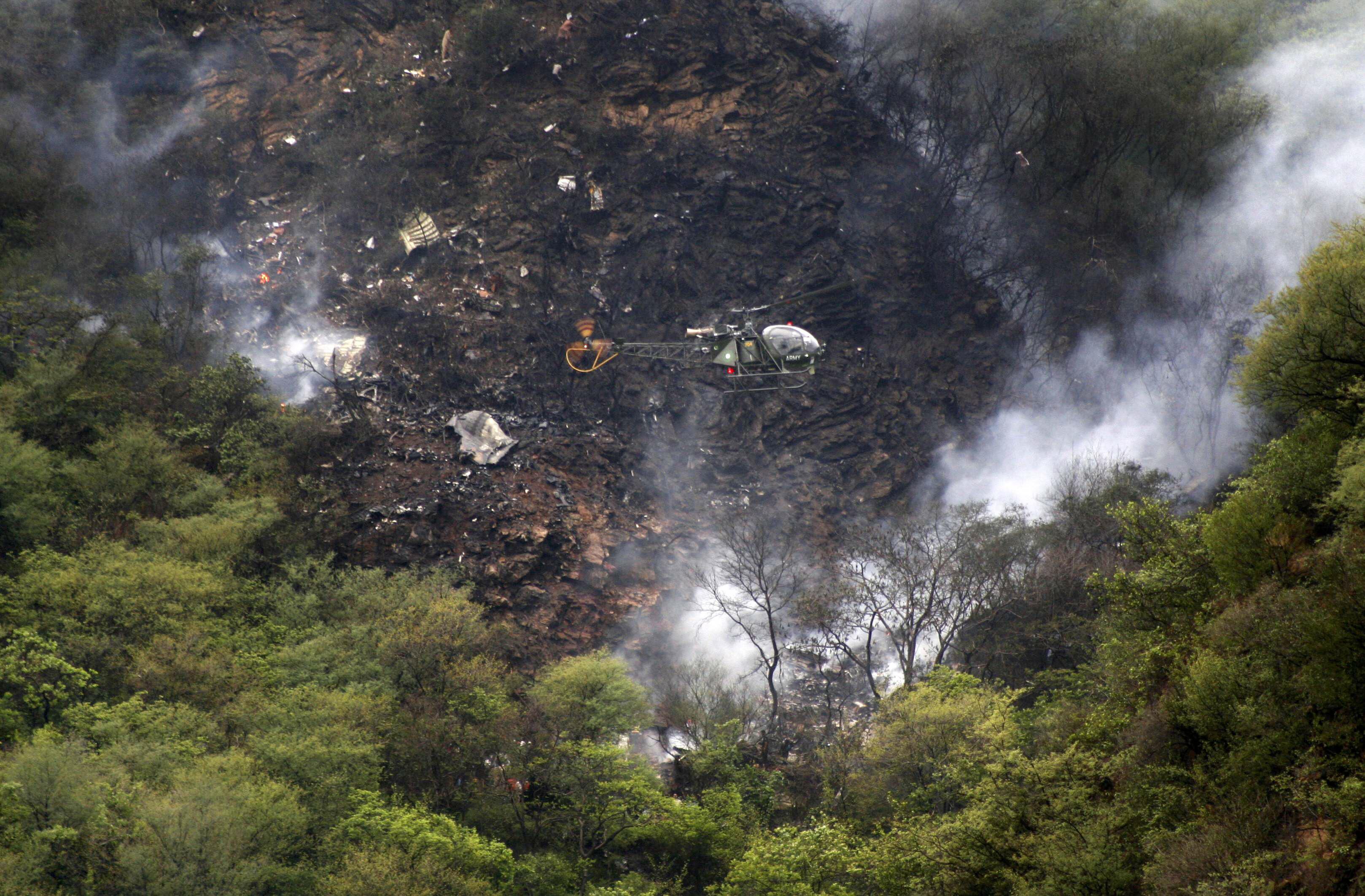 the airblue plane crash site in islamabad photo reuters