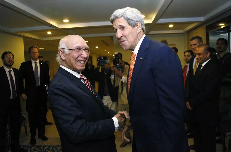 in this file photo us secretary of state john kerry is greeted by national security advisor sartaj aziz l shortly after arriving in islamabad on january 12 2015 photo afp in this file photo us secretary of state john kerry is greeted by national security advisor sartaj aziz l shortly after arriving in islamabad on january 12 2015 photo afp