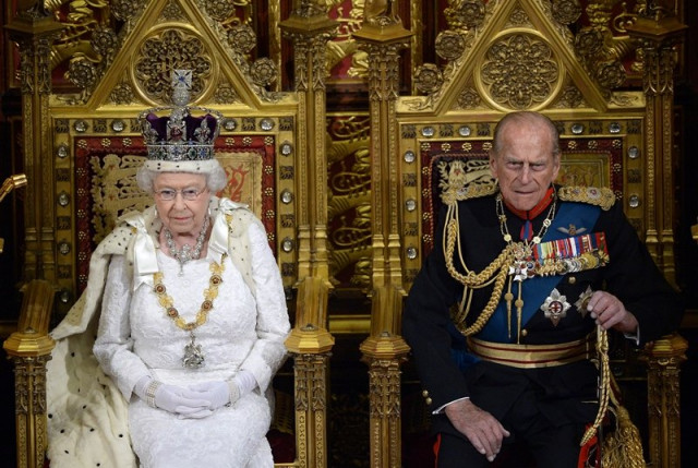 a file photo britain 039 s queen elizabeth ii l seated on the throne in the house of lords next to prince philip duke of edinburgh r photo afp a file photo britain 039 s queen elizabeth ii l seated on the throne in the house of lords next to prince philip duke of edinburgh r photo afp