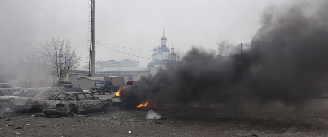 a car burns on the street after a shelling by pro russian rebels of a residential sector of mariupol eastern ukraine january 24 2015 photo reuters a car burns on the street after a shelling by pro russian rebels of a residential sector of mariupol eastern ukraine january 24 2015 photo reuters