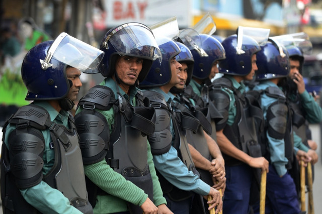 bangladeshi police stand guard during a nationwide strike called by the bangladesh nationalist party bnp led alliance in dhaka photo afp bangladeshi police stand guard during a nationwide strike called by the bangladesh nationalist party bnp led alliance in dhaka photo afp
