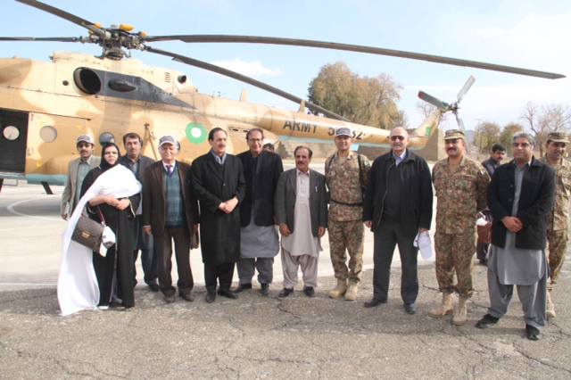 a delegation of senate defence committe led by chairman mushahid hussain sayed in a group photo after landing in north waziristan on sunday photo afp
