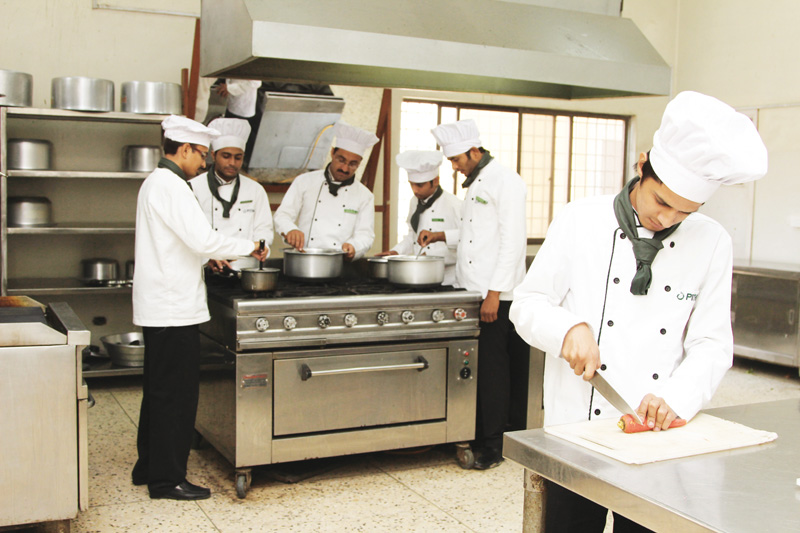 students practise cutting vegetables at pithm the institute offers a variety of junior chef courses among others and that too over a short span of four weeks photo aysha saleem express