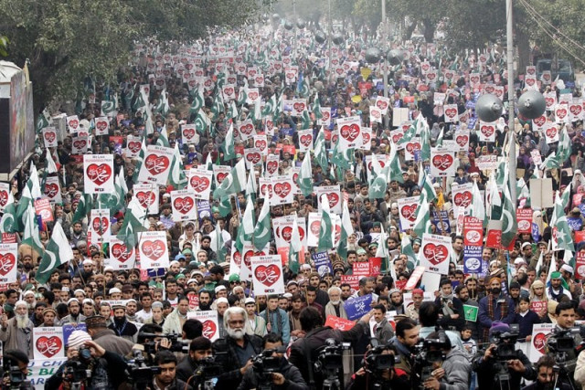 protesters carried placards and banners saying i love my prophet at the demonstration photo shafiq malik express protesters carried placards and banners saying i love my prophet at the demonstration photo shafiq malik express