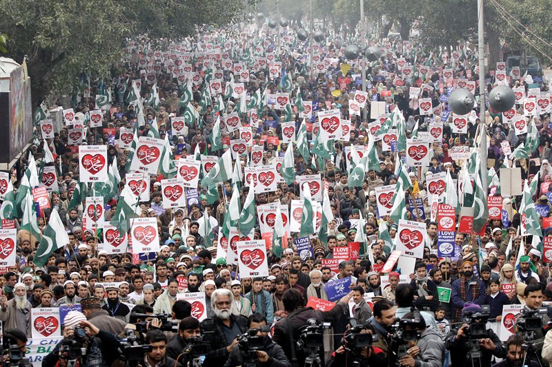 protesters carried placards and banners saying i love my prophet at the demonstration photo shafiq malik express