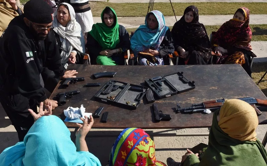 a pakistani anti terrorist squad ats police official displays various types of firearms during a weapons training session for school college and university teachers in peshawar on january 27 2015 photo afp a pakistani anti terrorist squad ats police official displays various types of firearms during a weapons training session for school college and university teachers in peshawar on january 27 2015 photo afp